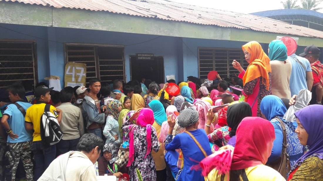 On May 9, a record-breaking 81.6 percent of Filipino voters went to the polls to elect a new president. Voters line up in Butig Lanao del Sur. Photo by Derkie Alfonso