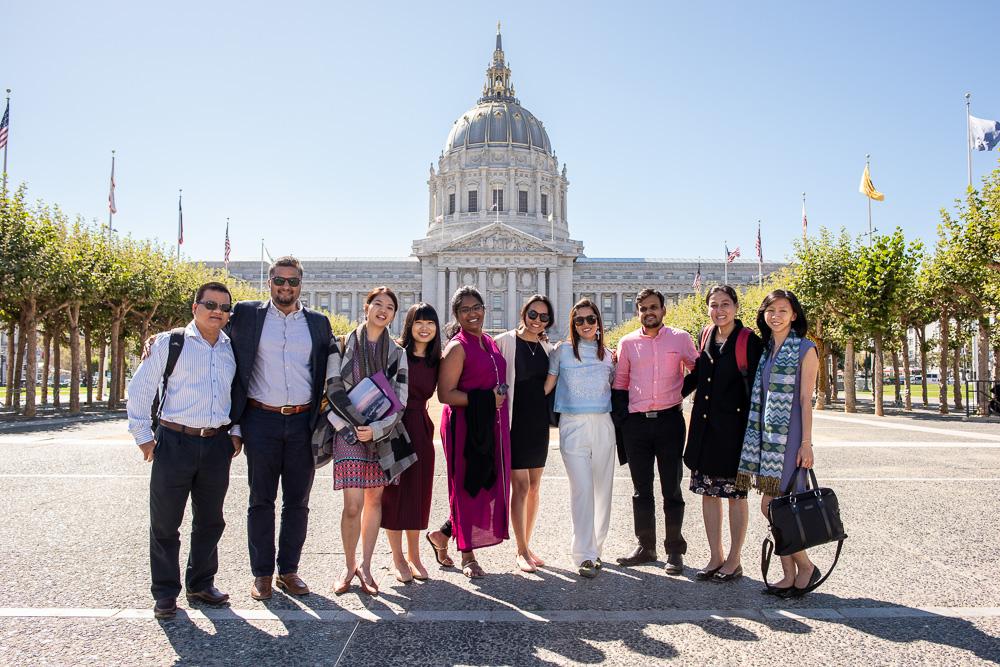 Asia Foundation Development Fellows gather for photo outside San Francisco City Hall