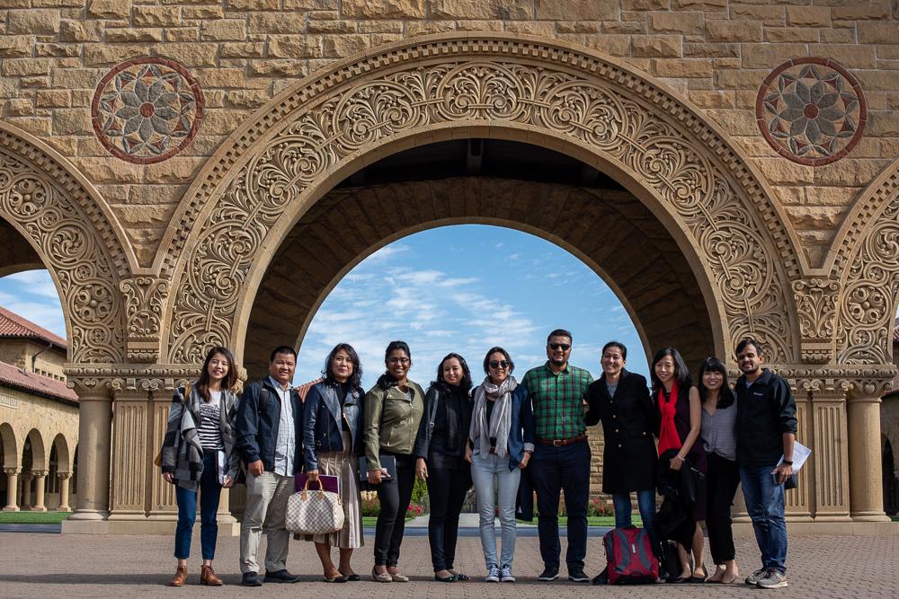 Development Fellows gather for photo outside Stanford University