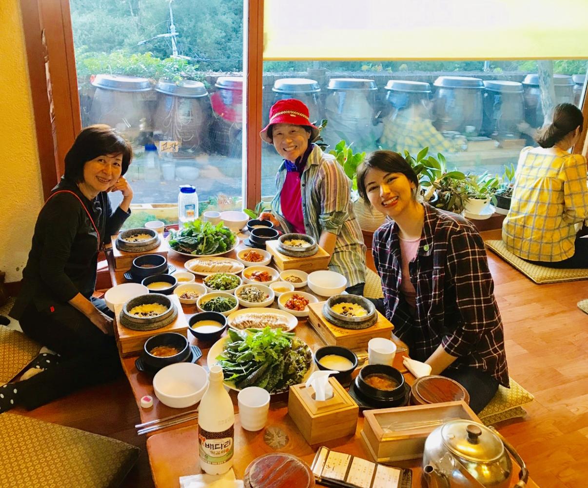 Three women sitting at a restaurant