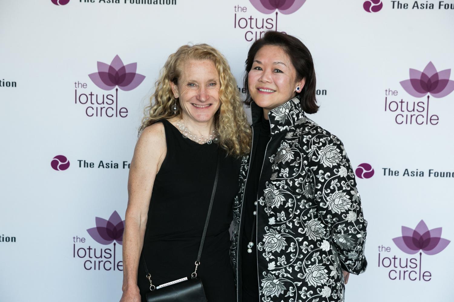Linda Greub and Winnie Feng smile for a photo