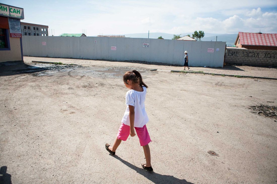 Ariuna’s daughter, Amaraa, walks the short distance from their apartment to School #87.
