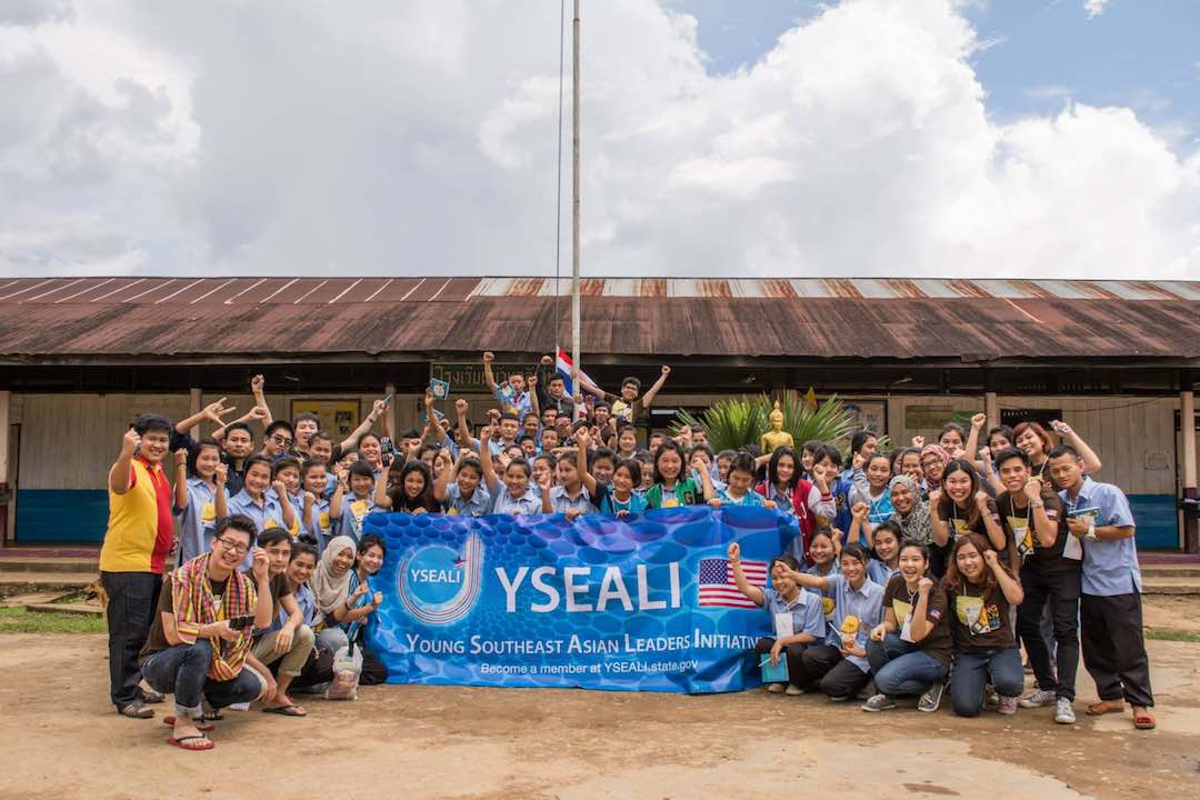 A group of young people pose with YSEALI banner