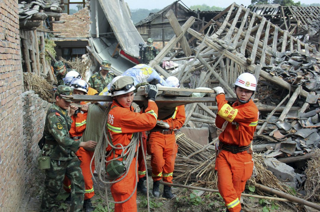 A Rescue Team Is Evacuating An Old Woman 1080x716 