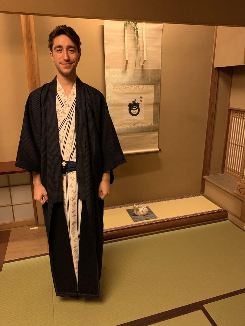 young man wearing kimono in a traditional Japanese room