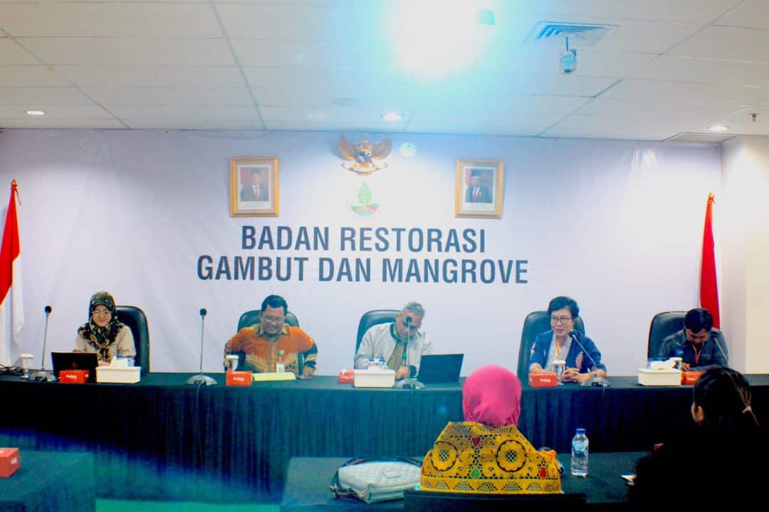 Two women and three men participate in a panel on mangrove forest restoration