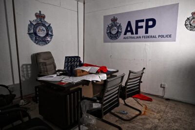 A room imitating an Australian Federal Police office is pictured inside an abandoned scam centre in O'Smach town on the Thai-Cambodian border on 12 March 2026 (Lillian Suwanrumpha/AFP via Getty Images)