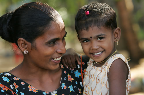 Many of Sri Lanka's displaced families have only recently returned to their homes, such as this Tamil woman and child from the Batticaloa district in the east.