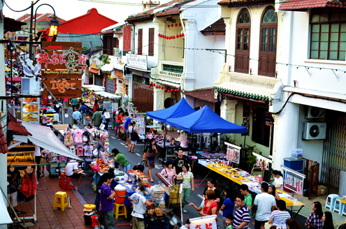 Shoppers at a street market in Malaysia